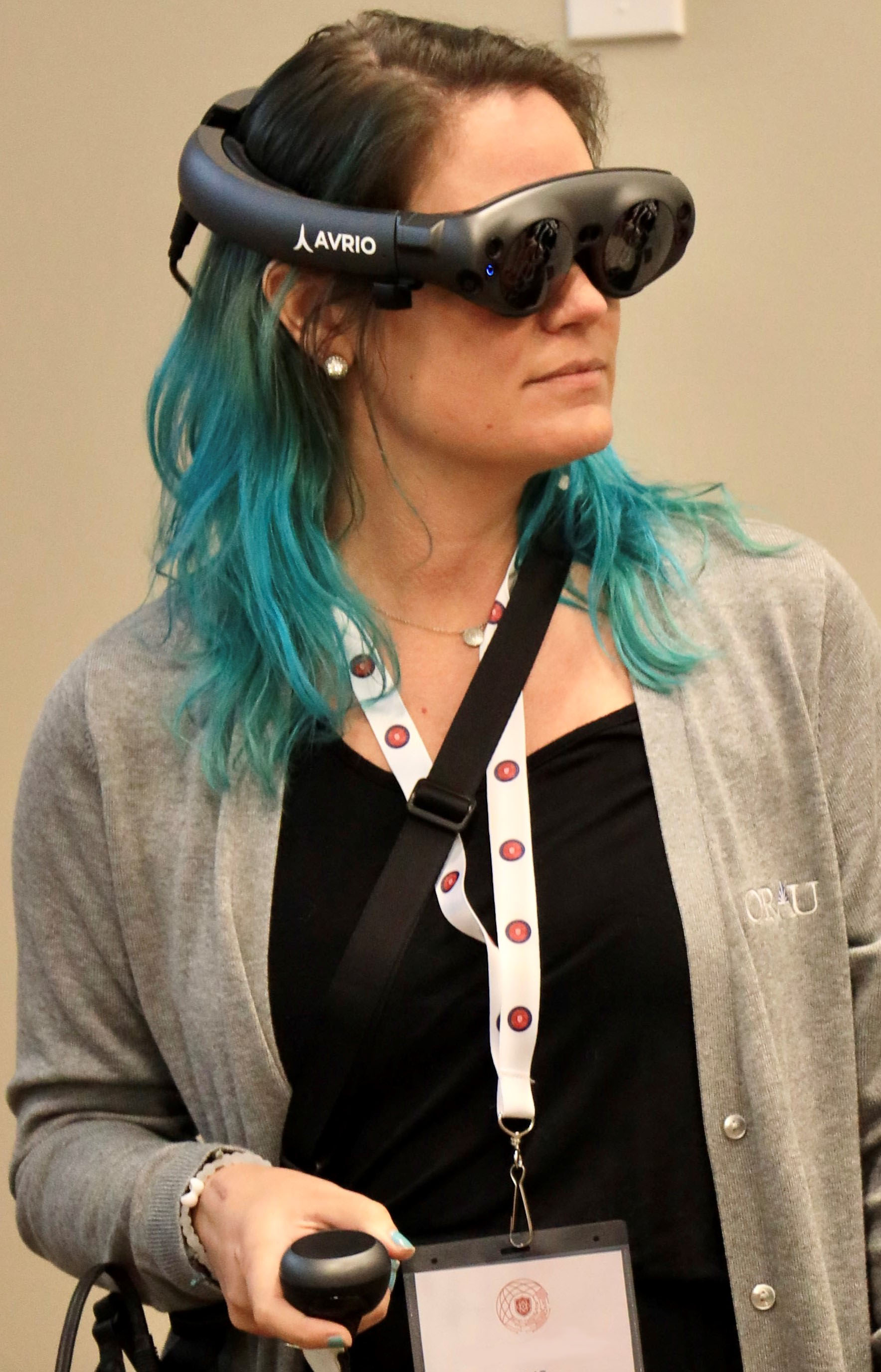 An XR Symposium attendee tries out an AR headset.