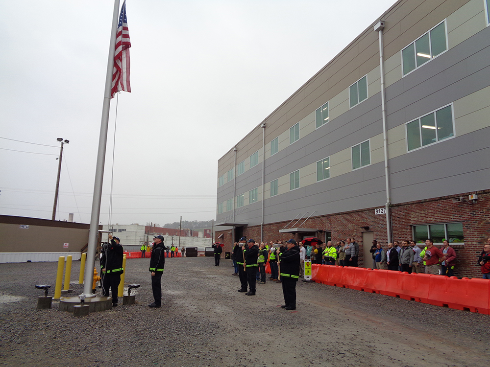 Uranium Processing Facility veterans are recognized during a ceremony outside the Construction Support Building.