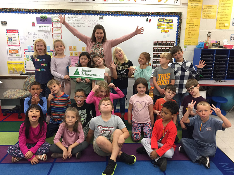 A Y-12 employee hams it up with a Junior Achievement class of six-year-olds.