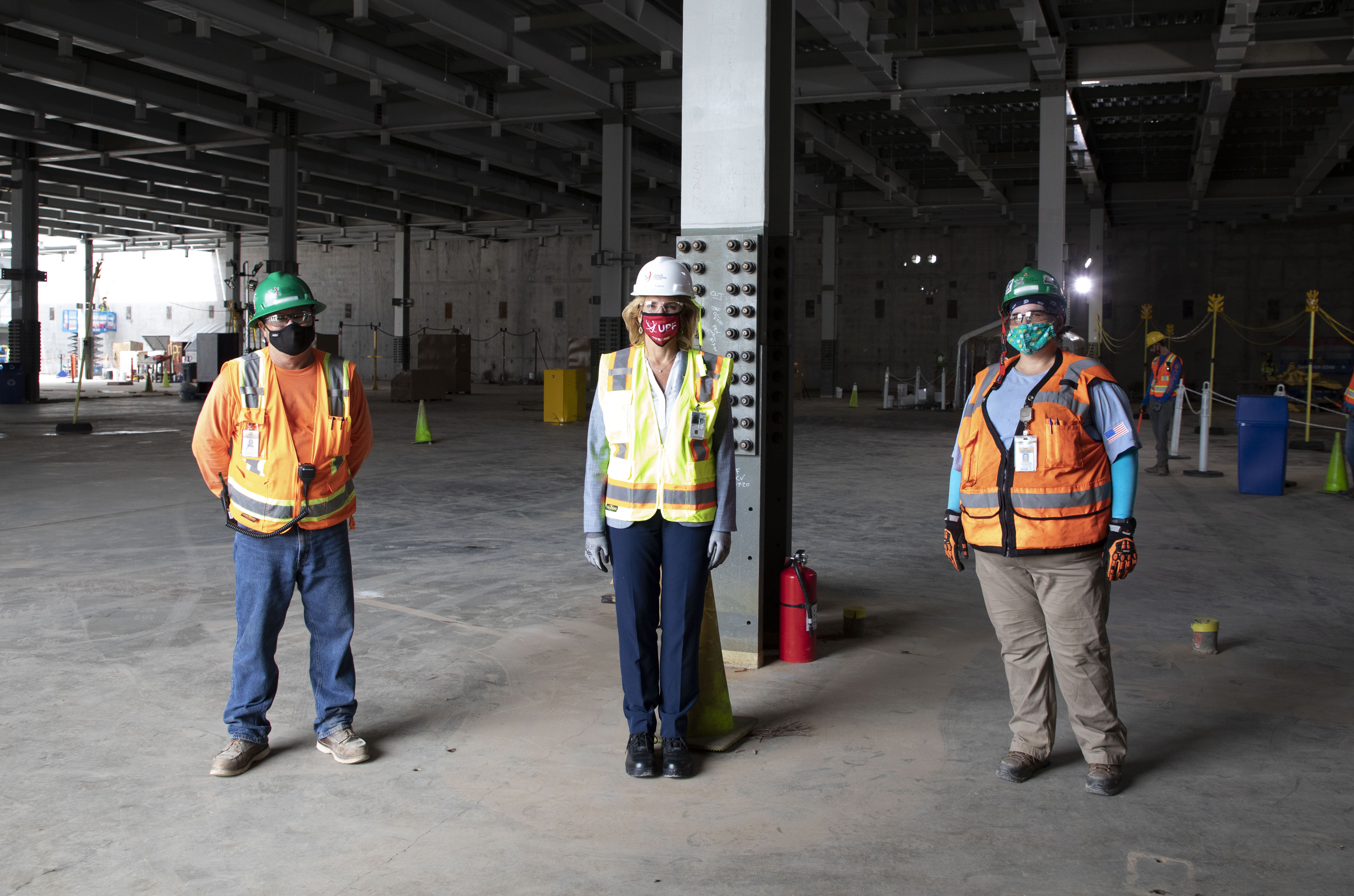 NNSA Administrator Lisa E. Gordon-Hagerty (center) with UPF Iron Workers in the Main Process Building