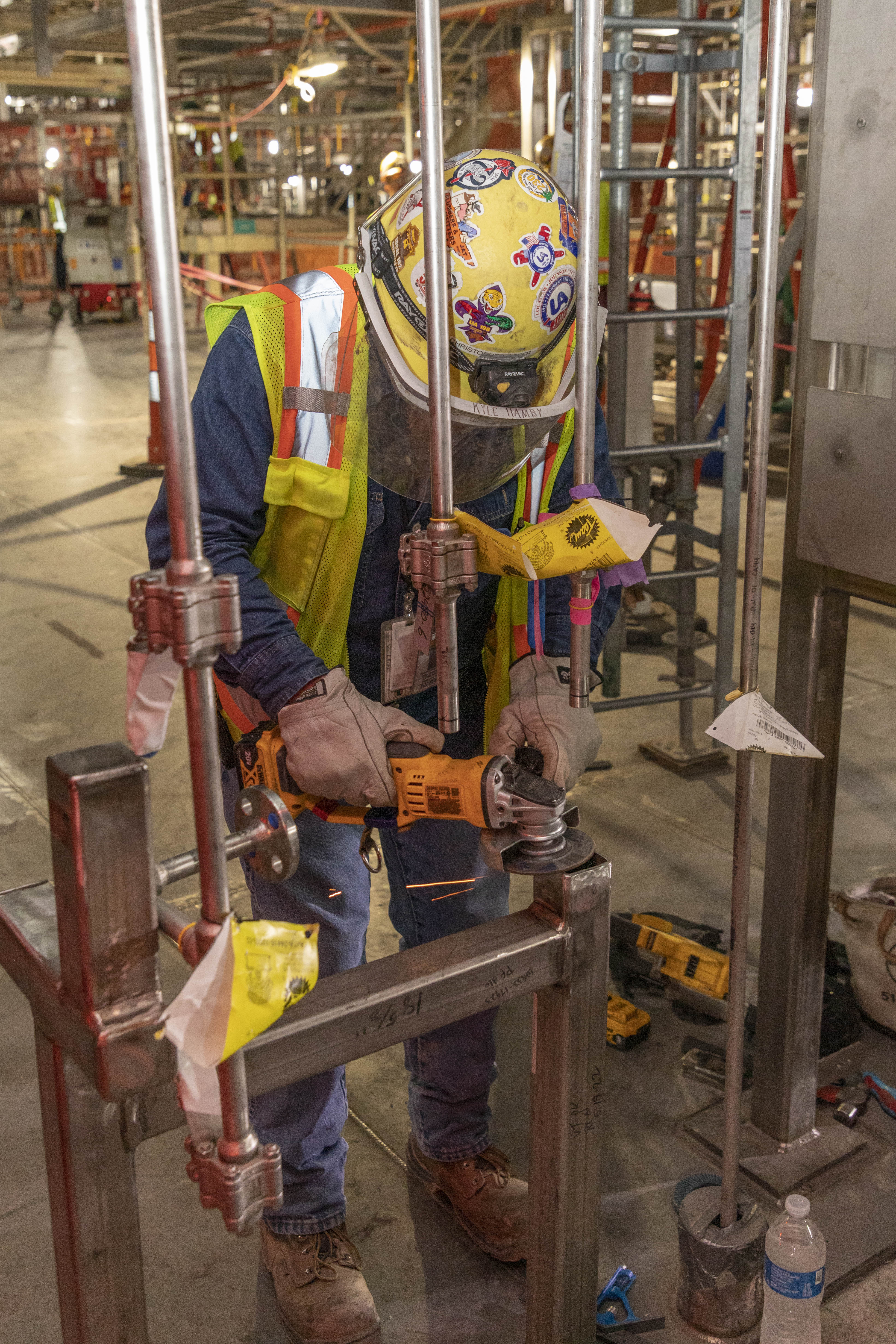 Pipefitter working in the Main Process Building