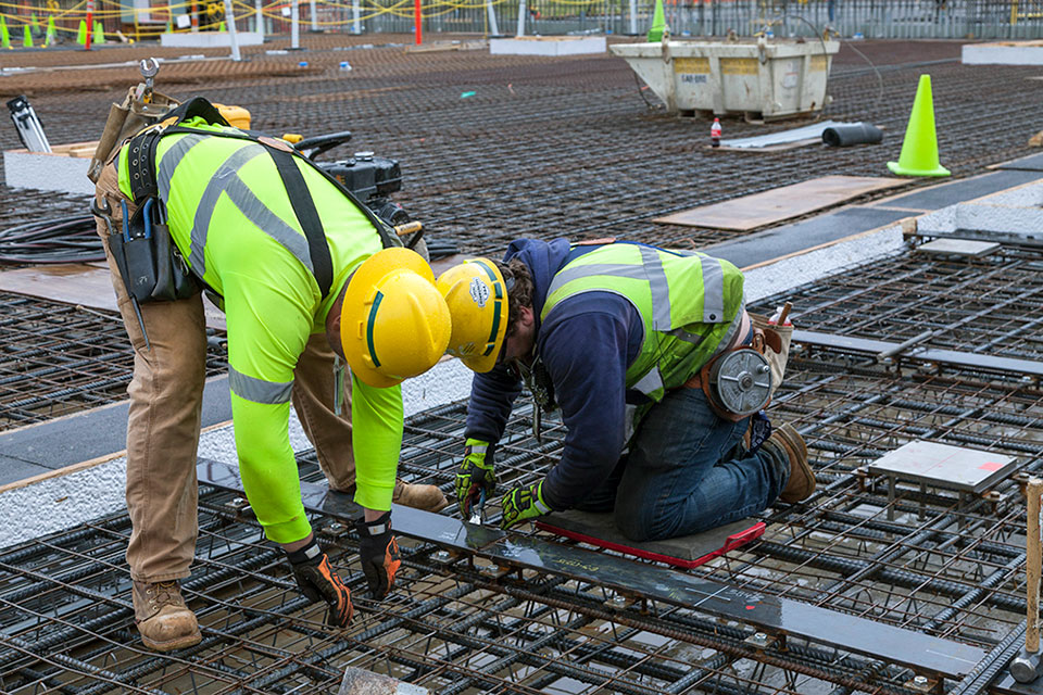 In addition to placing concrete, crews are installing rebar and embeds on the west topper slab of the Main Process Building.