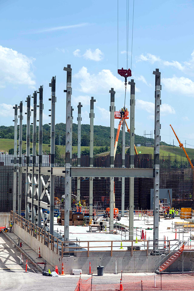 Structural steel continues to be installed at the Uranium Processing Facility Project’s Salvage and Accountability Building. The steel columns currently being installed are about 60 feet tall and weigh between 10.5 and 12.5 tons each. 
