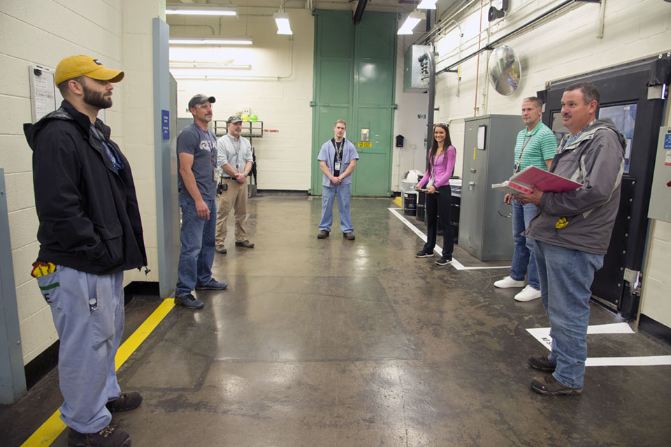 Y-12’s skill players in Production Operations hold a meeting while practicing social distancing.