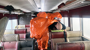 For one exercise, the Y-12 team members Doug Allen and Jeff Foster had to evacuate a train car with victims exposed to a biological agent.