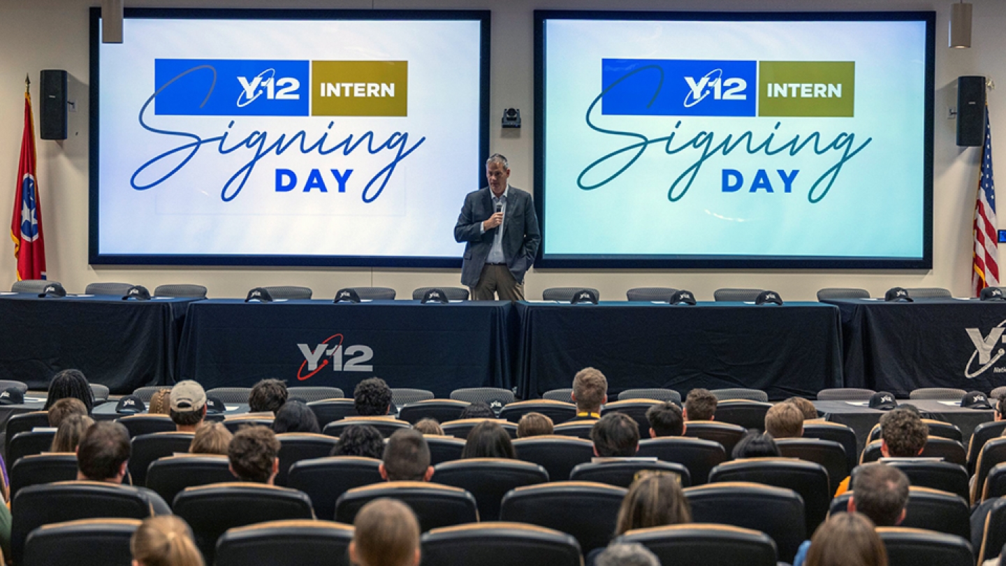 Consolidated Nuclear Security President and CEO Todd Ailes addresses Y-12’s summer interns as they prepare to signify their commitment to employment.