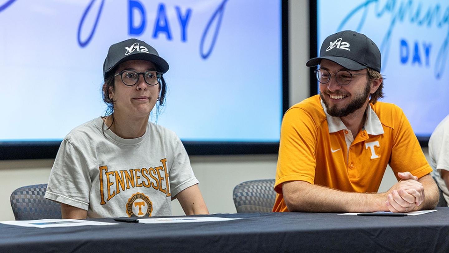 After signing their commitments to employment, Y-12’s newest employees donned official Y-12 ball caps. 