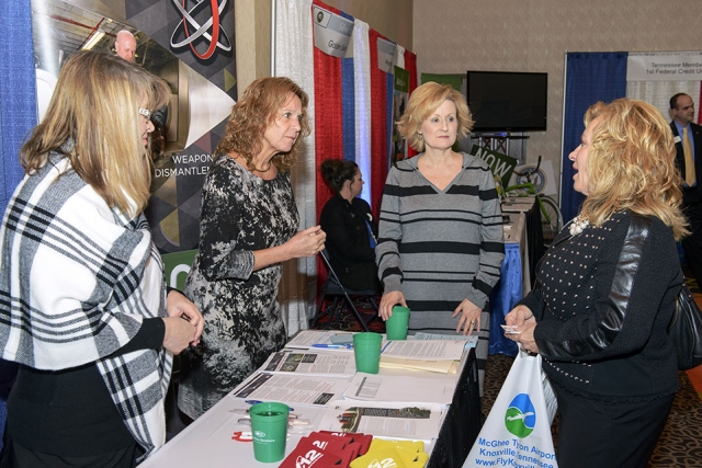 From left: Connie Polson, Elaine Najmola and Lisa Copeland discuss opportunities with a participant at the Tennessee Veterans Business Association Expo.