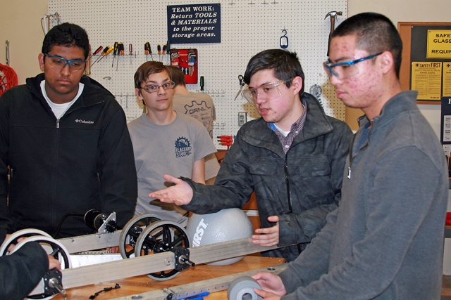 Students from Farragut High School work on their entry for the FIRST (For Inspiration & Recognition of Science & Technology) robotics competition. 