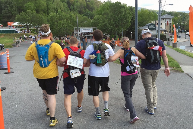 UPF’s five-person team won the Team Civilian Light Full March award for completing a relay in under eight hours. From left: Jim Schumacher, Matt Crookshanks, Brad Kramer, Tina Sowers and Jamie Lesko at the finish line. 