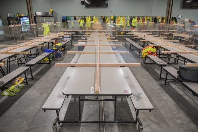 As part of the project’s COVID-19 safety actions, plexiglass partitions were installed and placed on breakroom tables to maximize social distancing while eating.