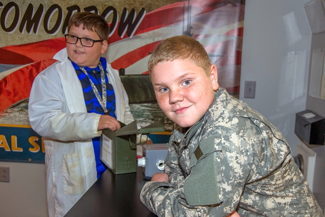 Students from Fairview Elementary in Scott County work in the Y-12 storefront during the recent grand opening at Junior Achievement of East Tennessee BizTown.