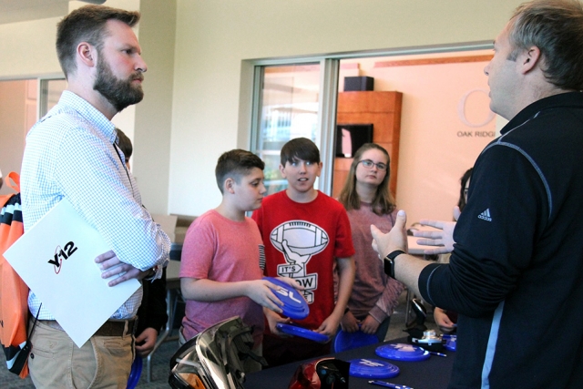 Robert Stephen from Norwood Middle School and his students listen to Steven Brooks of SL Tennessee, LLC at the kick off for Dream it. Do it. at Oak Ridge Associated Universities’ Pollard Auditorium.