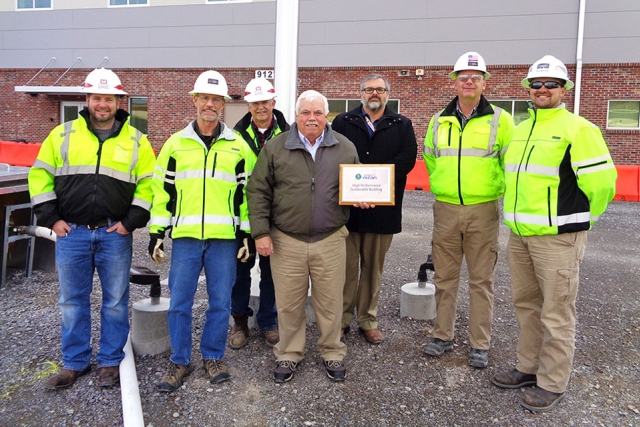 NNSA recently designated UPF’s Construction Support Building as a High Performance Sustainable Building. Representatives from the team include (from left to right) UPF Project Office Construction Manager Mike Pearson; UPF Project Office Construction Integrator Halen Philpot; UPF Project Office Field Engineer Bud Slaven; UPF Project Office Site Infrastructure and Services Federal Project Director Don Peters; CNS Energy Manager Charlie Sexton; USACE Resident Engineer Jason Phillips; and USACE PM Forward Joe D