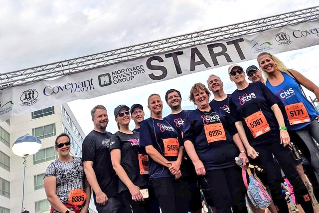 CNS runners at the start of the Knoxville Covenant Health Marathon.