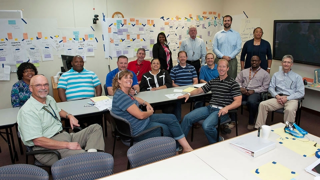 An integrated team of Pantex and Y-12 employees (some members shown here) work on the beginning stages of the container improvement initiative. 