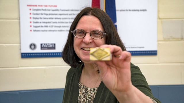 Donna Riggs of the NNSA Production Office stamped the first production unit to indicate it was certified.