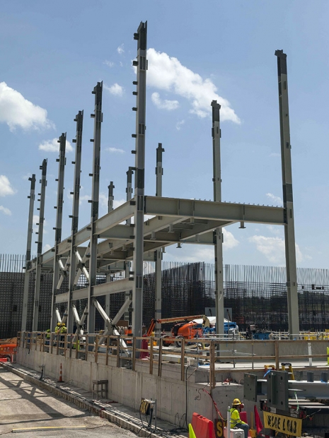 The first pieces of structural steel were installed at the Salvage and Accountability Building, marking a major milestone in the construction of the three-stories-tall building.