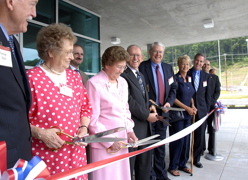 As one of the women pictured in a mural in the Jack Case Center cafeteria, Marie Guy was invited to a ribbon-cutting ceremony with photographer Ed Westcott in 2007. (Y-12 archive).