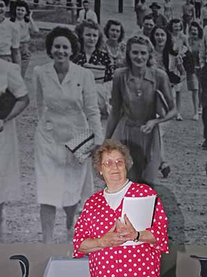 Marie Guy poses in a dress that echoes the polka-dot version she wore to work more than 60 years earlier. (Y-12 archive).