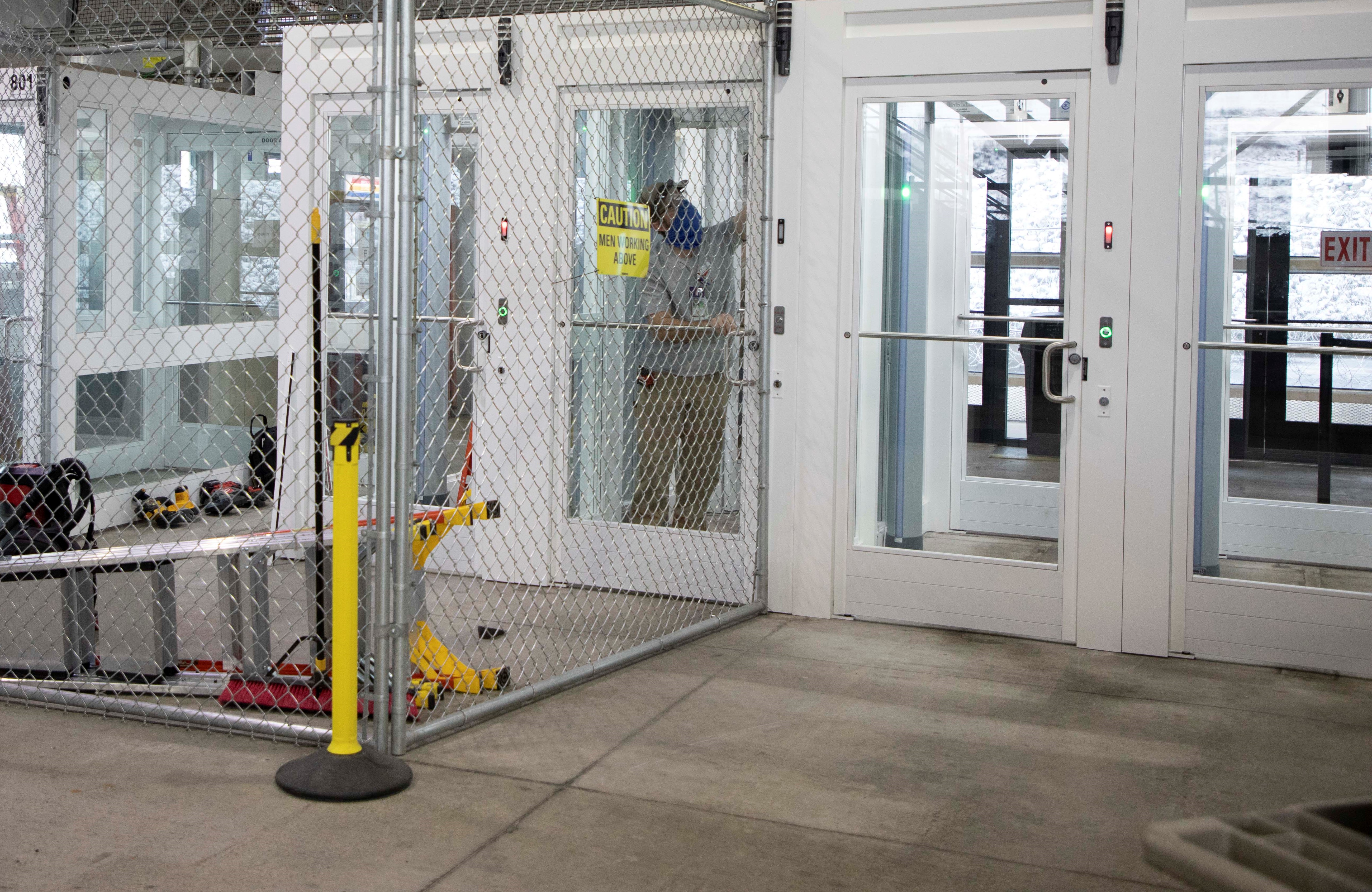 Barriers were used during the installation of the enterprise-standard booths to safely separate the construction work from those entering and exiting the post.