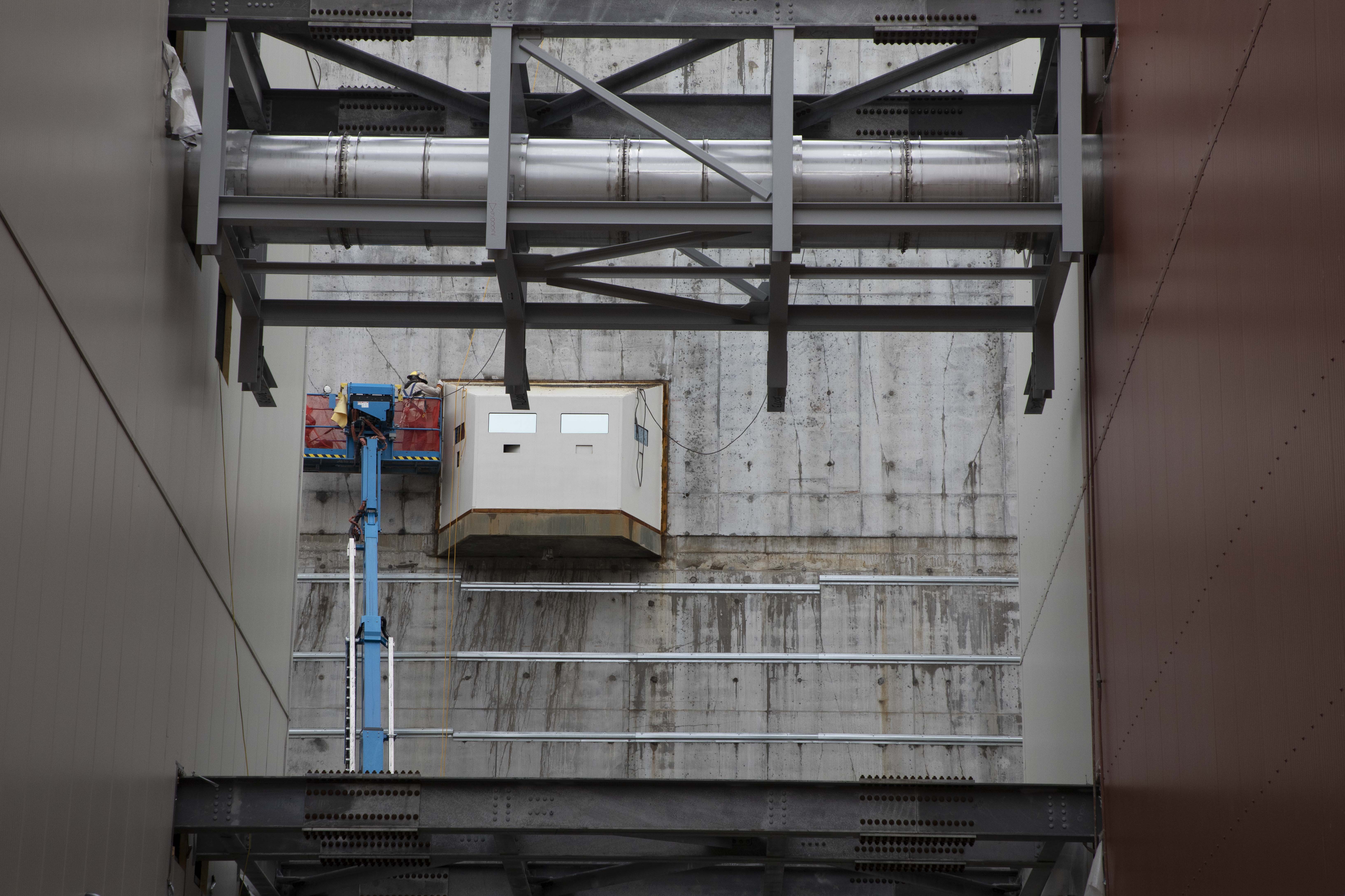 Ironworker welding on a Main Process Building EPOD