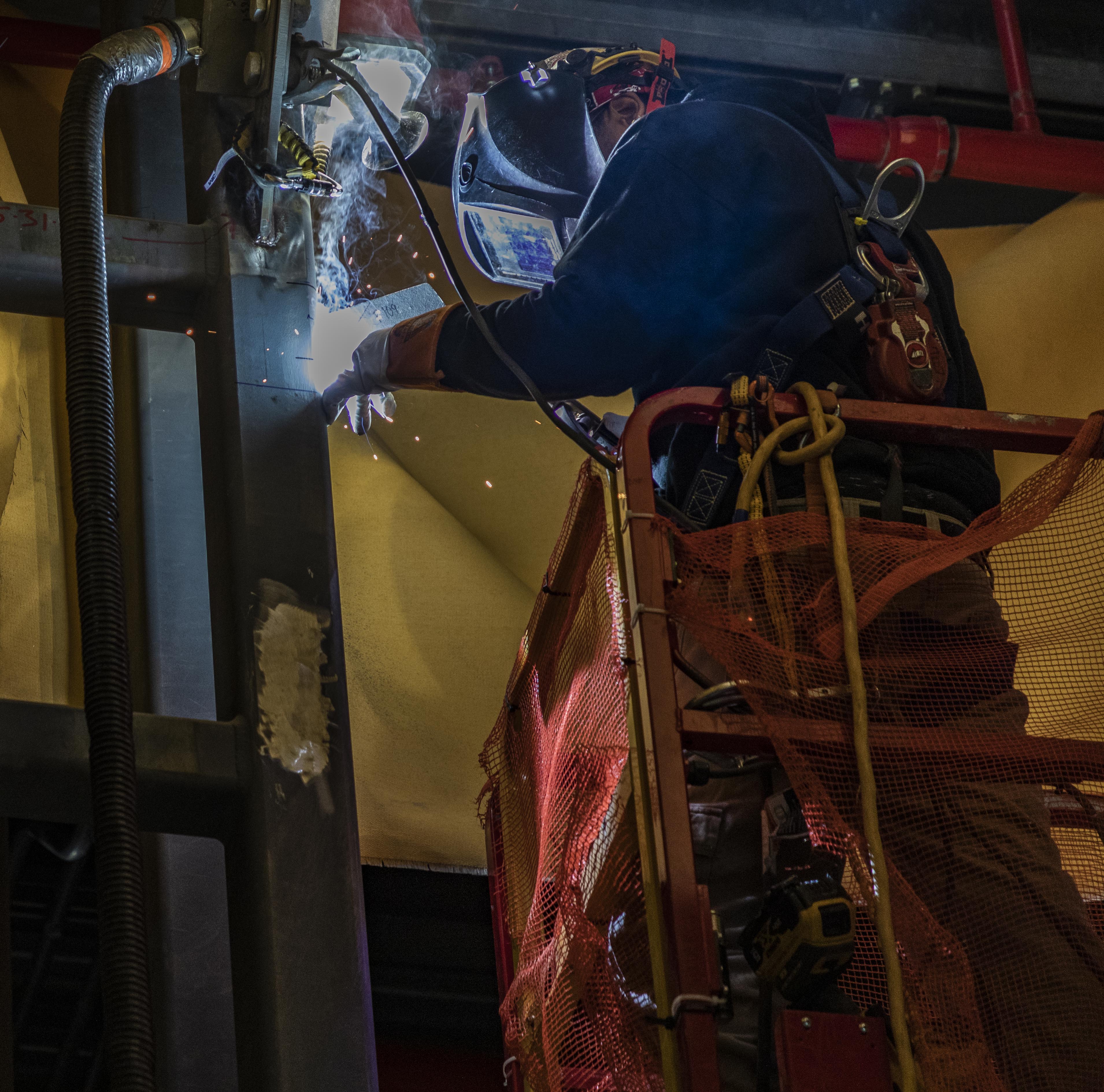 Electrician working in the Salvage and Accountability Building 