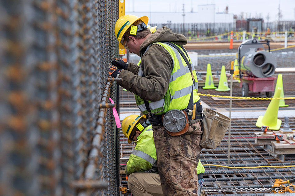 In addition to placing concrete for the base slab of the Main Process Building, crews also placed rebar for the walls.