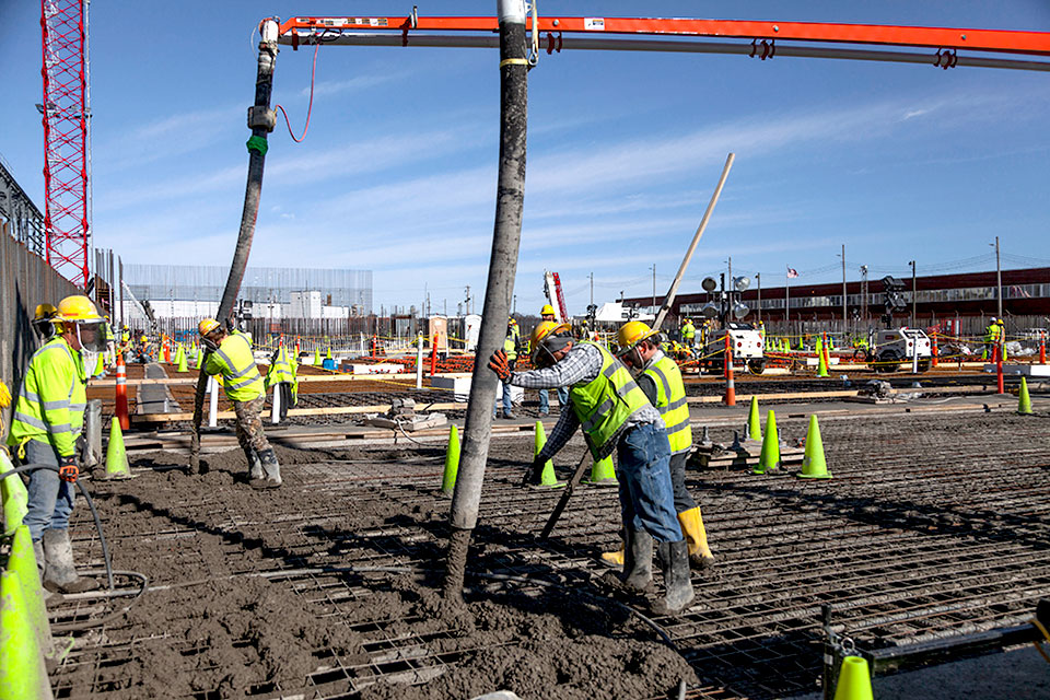 Nearly 24,000 cubic yards of concrete were placed for the slab of the Main Process Building, UPF’s largest facility. Concrete placement for the slab was completed on Feb. 16. Nearly 24,000 cubic yards of concrete were placed for the slab of the Main Process Building, UPF’s largest facility. Concrete placement for the slab was completed on Feb. 16.