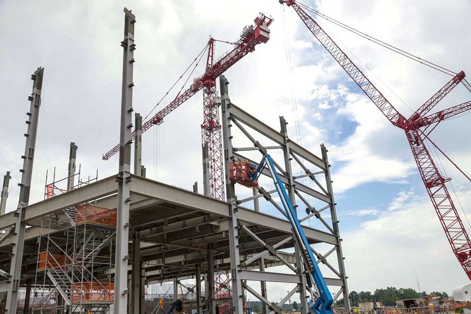 Ironworkers install steel on the second floor of the Salvage and Accountability Building at the Uranium Processing Facility. 