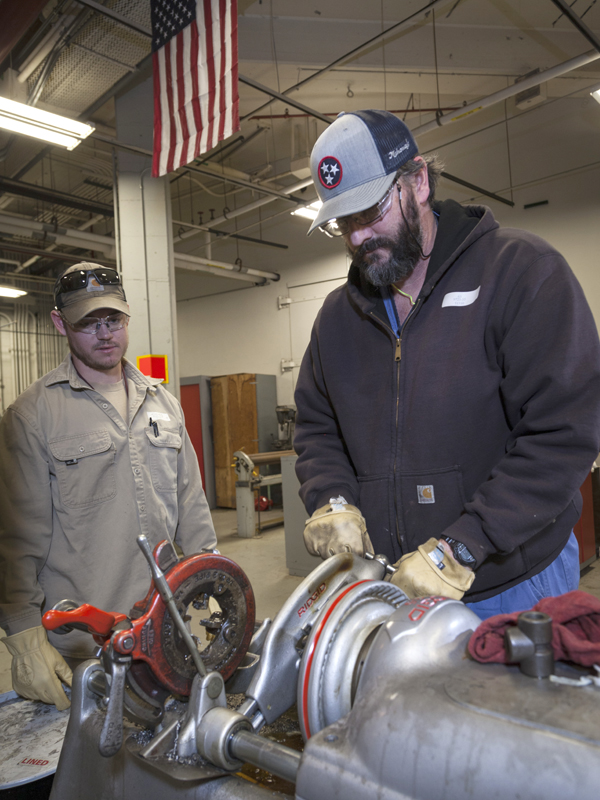 Monte Branstetter, left, a pipefitter apprentice, and Chris Drinnon, a fifth-year pipefitter apprentice 