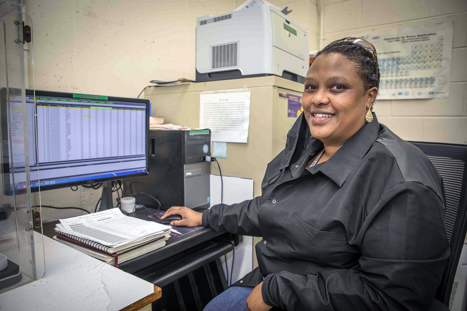 Worker reviews inductively coupled plasma-mass spectrometry data.