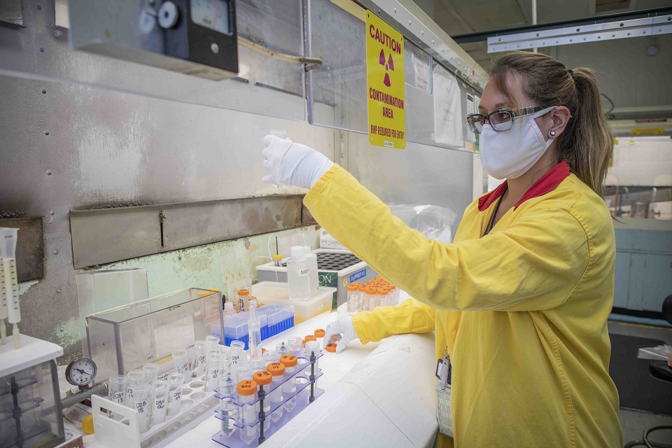 A chemist performs an initial sample analysis.