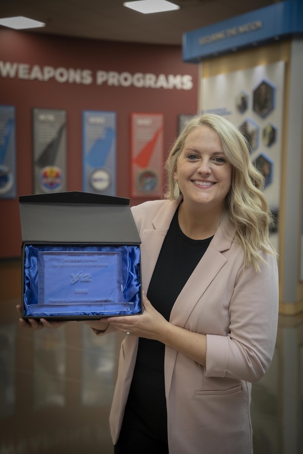 Jackie Kelly Award winner for Y-12 Melanie Fleury poses with her plaque.