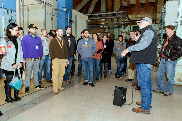 KJ Maddux and Bill Wilburn kick off the day with a tour of Y-12, offering the students an inside-the-fence glimpse of the kinds of nuclear security they’ve been studying.