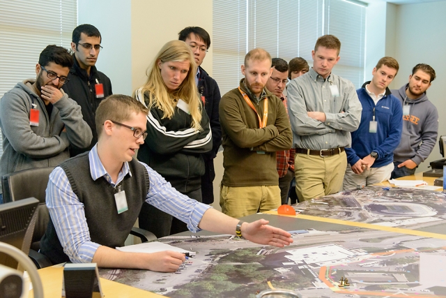 The blue team’s leader (Michael Moore, nuclear engineering student) describes his team’s next move to protect the virtual cache of enriched uranium.