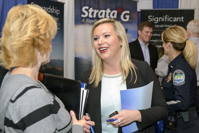 Y-12 Small Business Program Manager Lisa Copeland (left) interacts with a participant at the Tennessee Veterans Business Association Expo. 