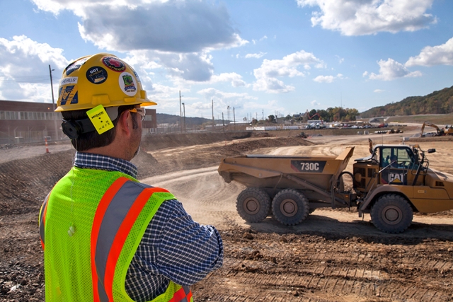 MyZone proximity detection system (as shown attached to the hard hat) alerts workers on the Uranium Facility Project when they are within 30 feet of heavy equipment. 