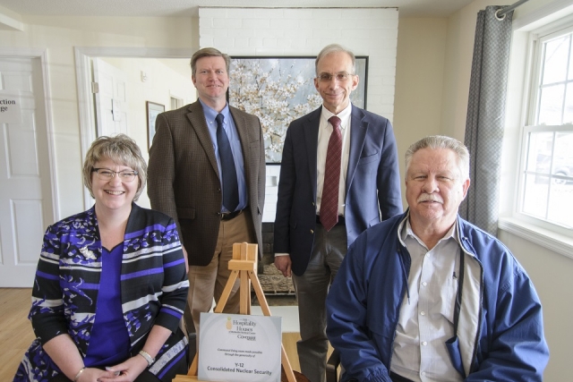 CNS Vice President and Deputy Enterprise Manager Michelle Reichert, Vice President and Y-12 Site Manager Bill Tindal, President and Chief Executive Officer Morgan Smith and Atomic Trades and Labor Council President Mike Thompson in the living room of Methodist Medical Center of Oak Ridge’s third hospitality house. 