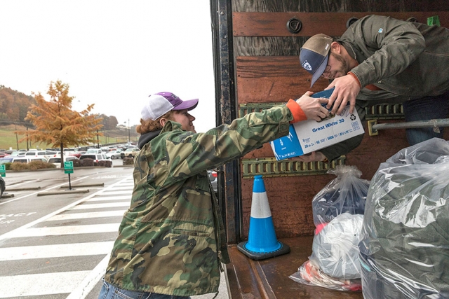 CNS employees at the Y-12 National Security Complex load coats and toiletries bound for Knoxville’s Volunteer Ministry Center.