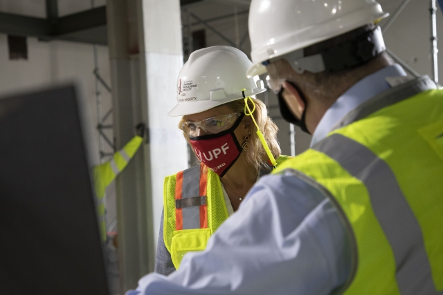 NNSA Administrator Lisa E. Gordon-Hagerty studies a rendering at the UPF Salvage and Accountability Building