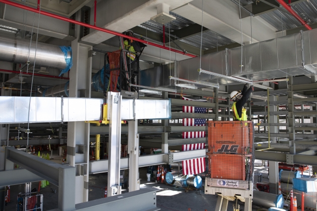 Pipe and hangers installation in the Salvage and Accountability Building.