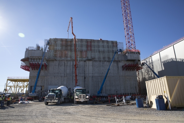 Crews at the Main Process Building pour concrete to complete it’s first wall placement for the third level.