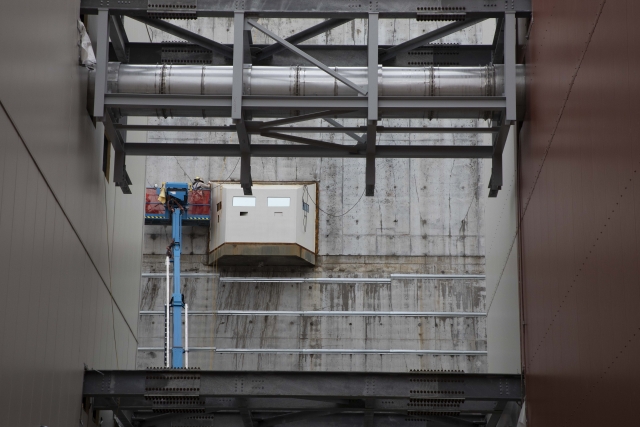 Ironworker welding on a Main Process Building EPOD