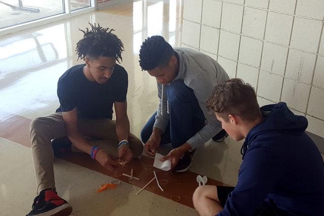 Oak Ridge High School students work on a project brought by Y-12 volunteers during Engineering Week, or EWeek. 