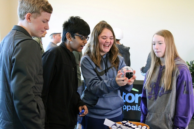 Students interact with industry displays at the Dream it. Do it. kickoff at Oak Ridge Associated Universities’ Pollard Auditorium. 