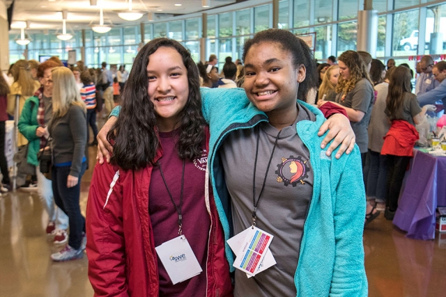 Cynthia, left, and Jada, both eighth graders at Robertsville Middle School, used communication and critical thinking skills to help their team win one of Introduce a Girl to Engineering’s tower challenges. “If we didn’t listen to each other, learn to work together, our tower would collapse,” Jada said.
