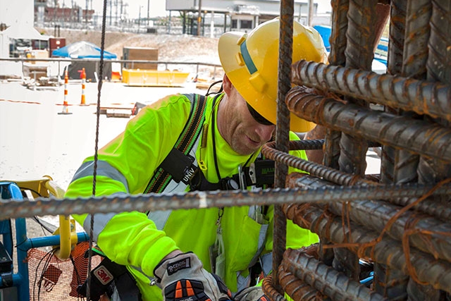 Detailing begins on rebar once the walls are up at the Main Processing Building at Uranium Processing Facility.