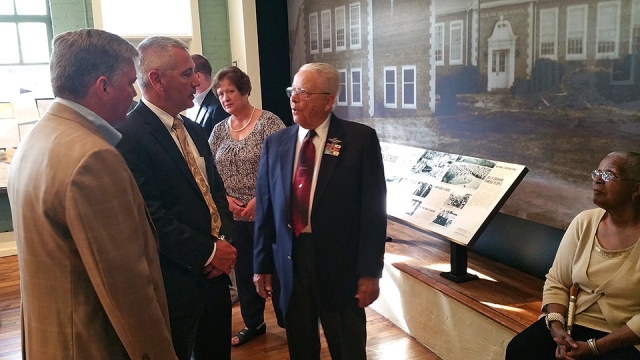 Y-12 Deputy Site Manager Gene Sievers talks with Tuskegee Airman Lt. Col. George Hardy at Green McAdoo Cultural Center.