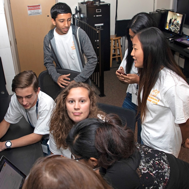 Roane County High School senior Avery (center) and other Materials Camp students work on their presentation for the final day of camp. Materials Camp “got me thinking about different avenues for college and a career,” said Avery, whose father is an electrician at the Y-12 National Security Complex.